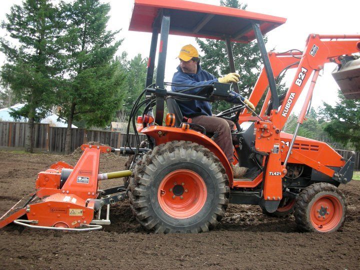 Bulldozer Flattening The Land — Santa Cruz, CA — Quilici Gardening