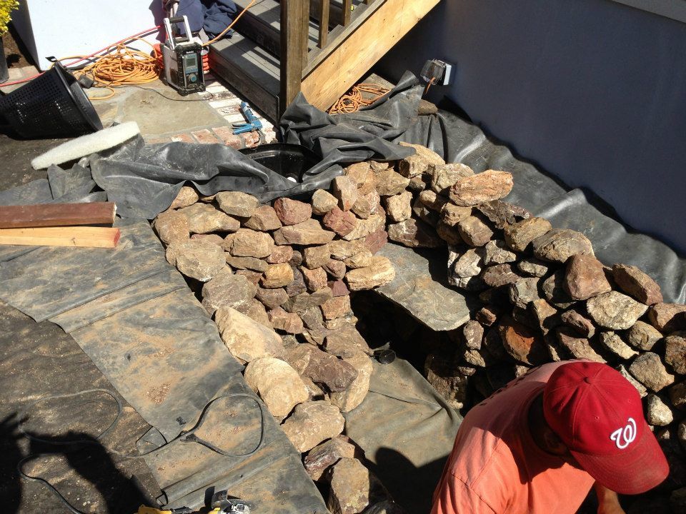 Stone Arrange On The Sidings Of The Pond — Santa Cruz, CA — Quilici Gardening