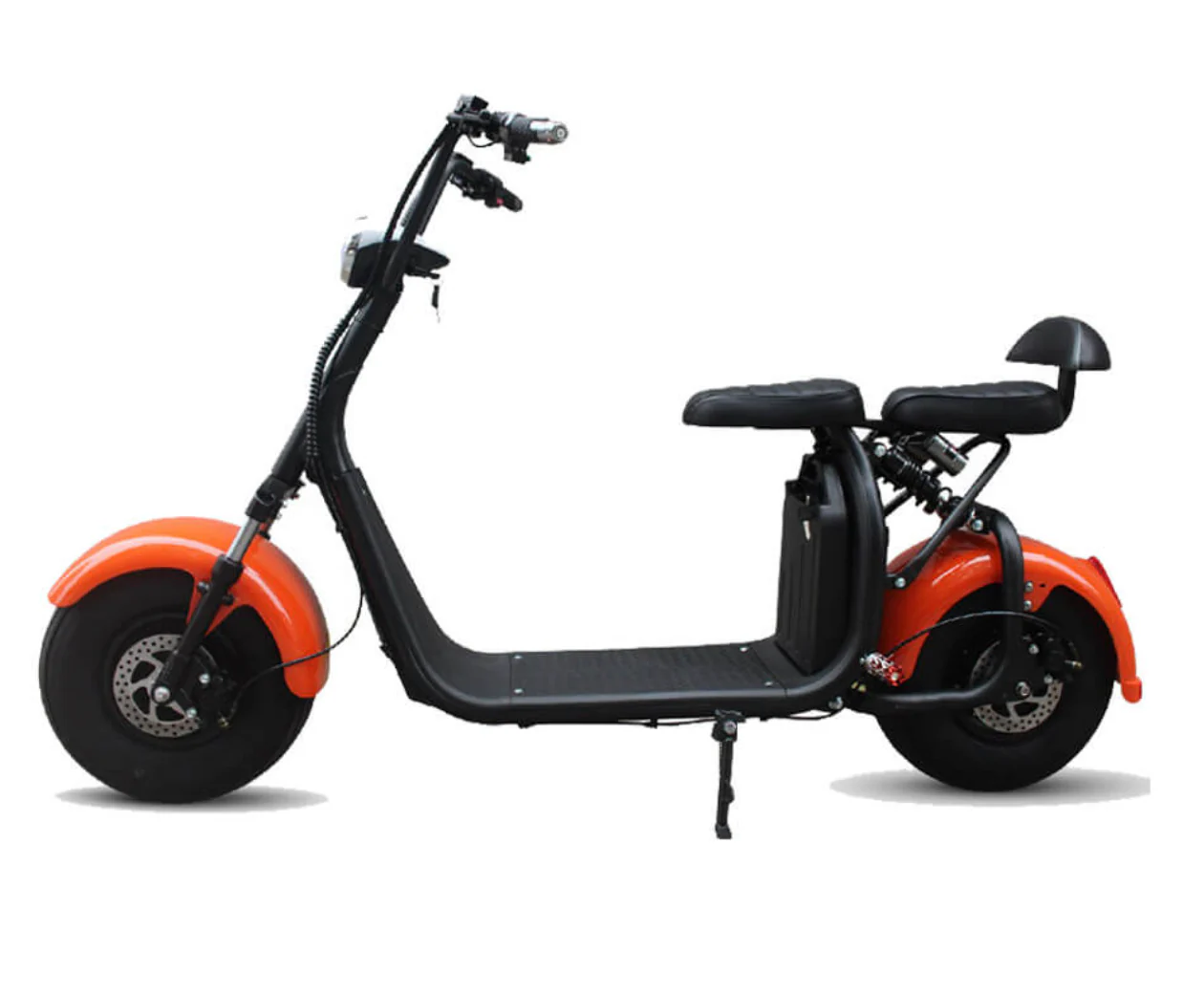 A black electric scooter is parked on the side of the road.