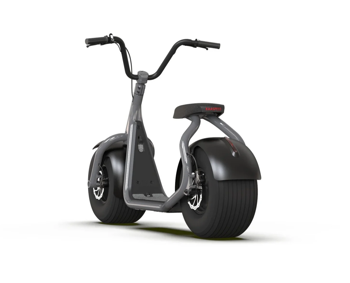 Gray electric scooter with thick tires, seat, and handlebars.