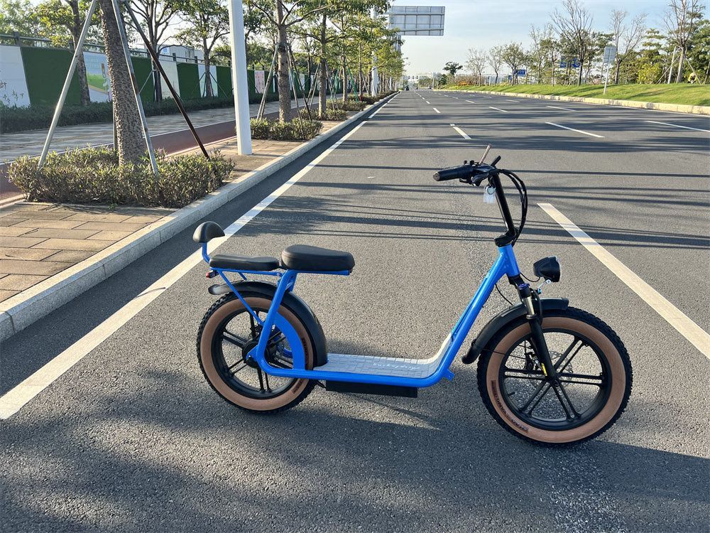 A black electric scooter with brown tires on a white background.
