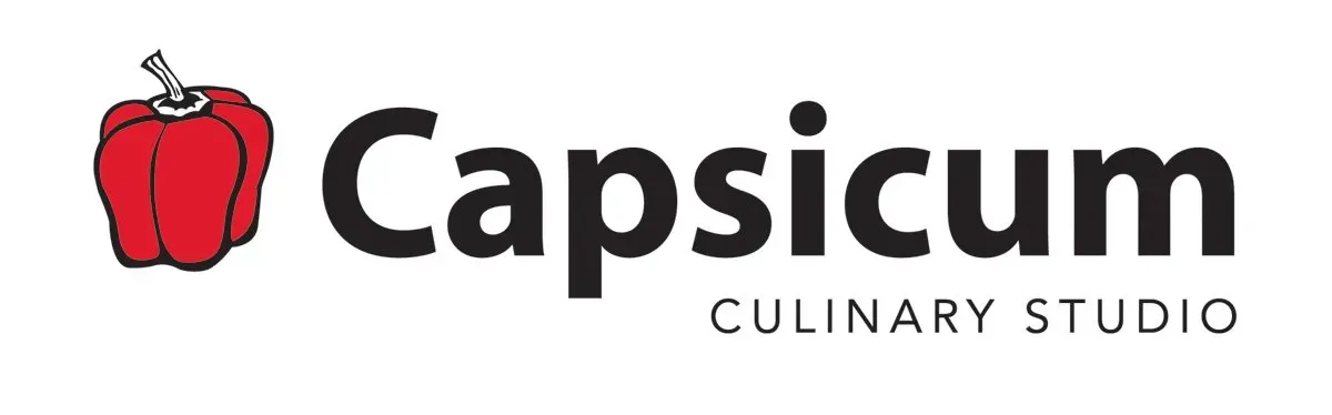 A logo for capsicum culinary studio with a red pepper on it