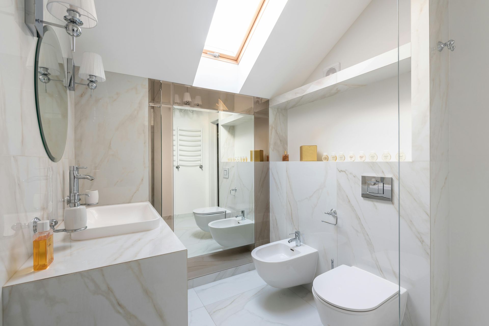 a man is standing on a ladder in a bathroom .