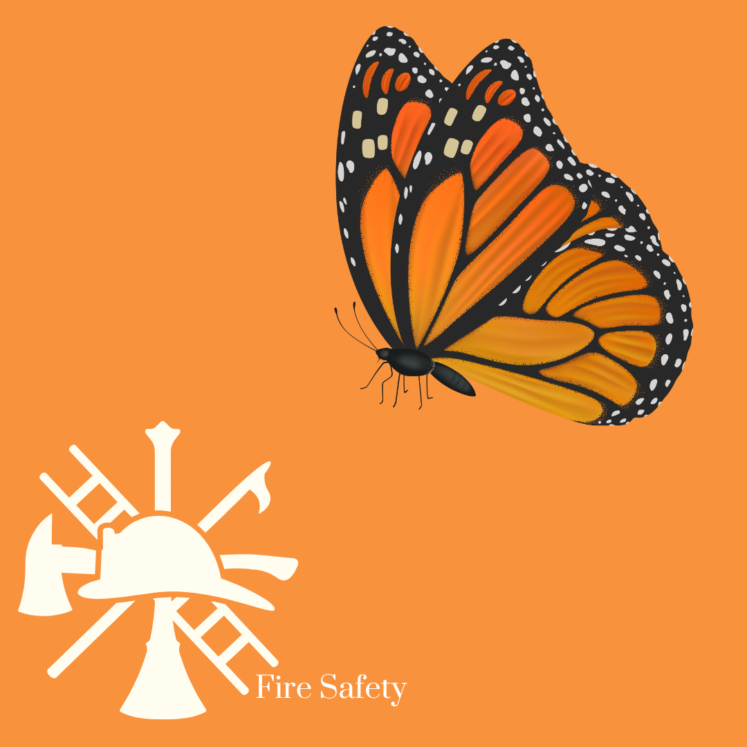 A woman wearing a crown of flowers and a fire safety logo