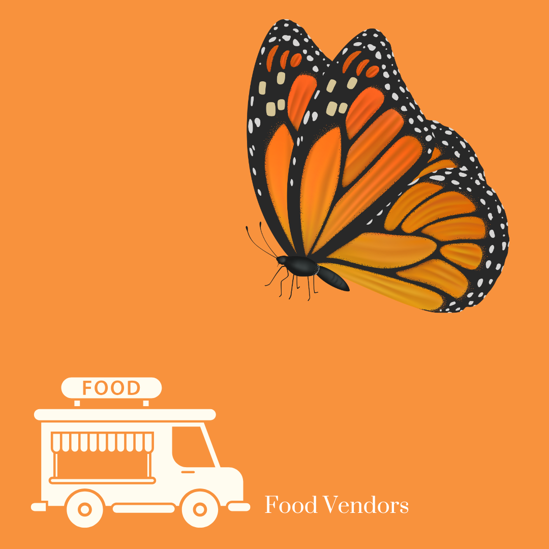 A woman with flowers in her hair has a food truck in front of her