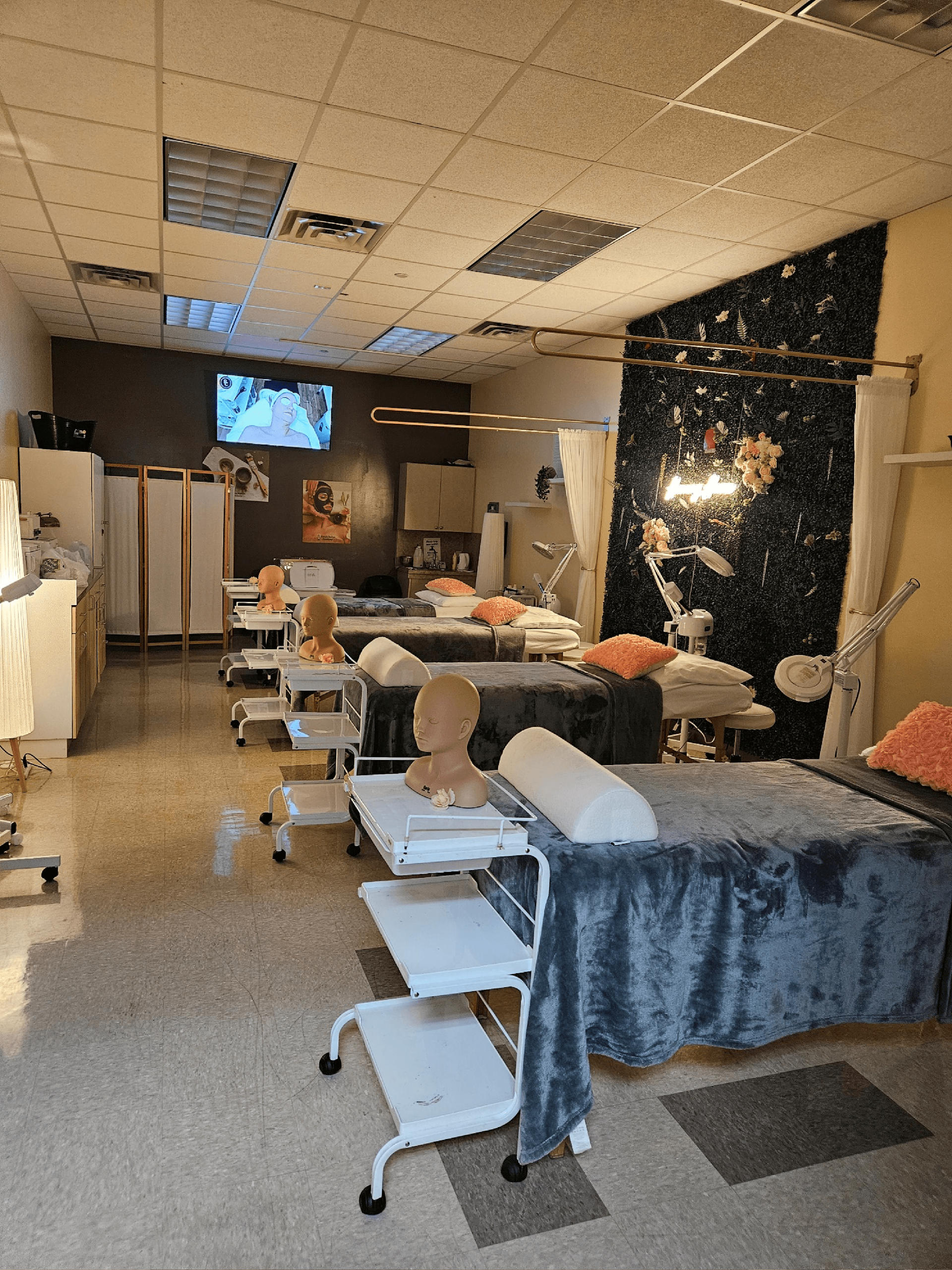 A man is cutting a man 's hair in a barber shop.
