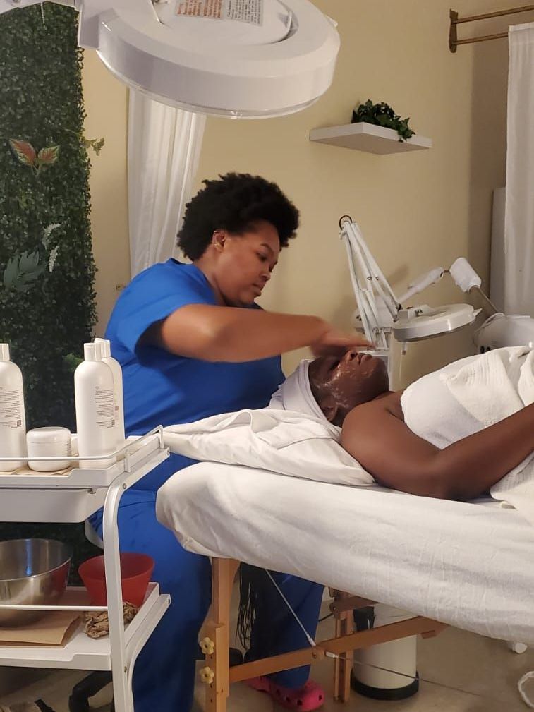 A group of women are getting their hair done in a salon