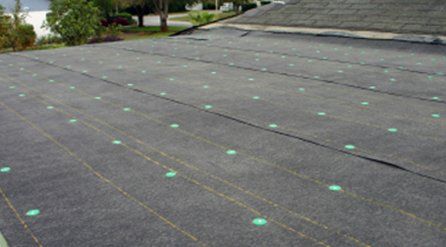 roofing felt laid out with green markers