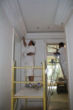 2 man painting the walls - Painting Contractors in Naples, FL