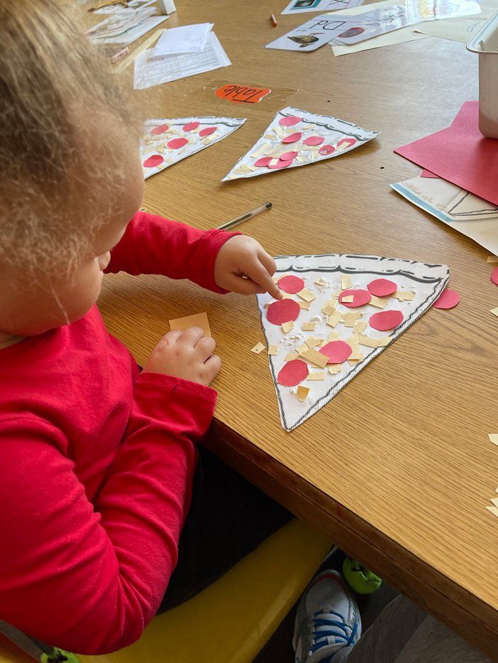 Little Kid Doing Pizza Cardboard — Knoxville, TN — Marcia’s Learning Center
