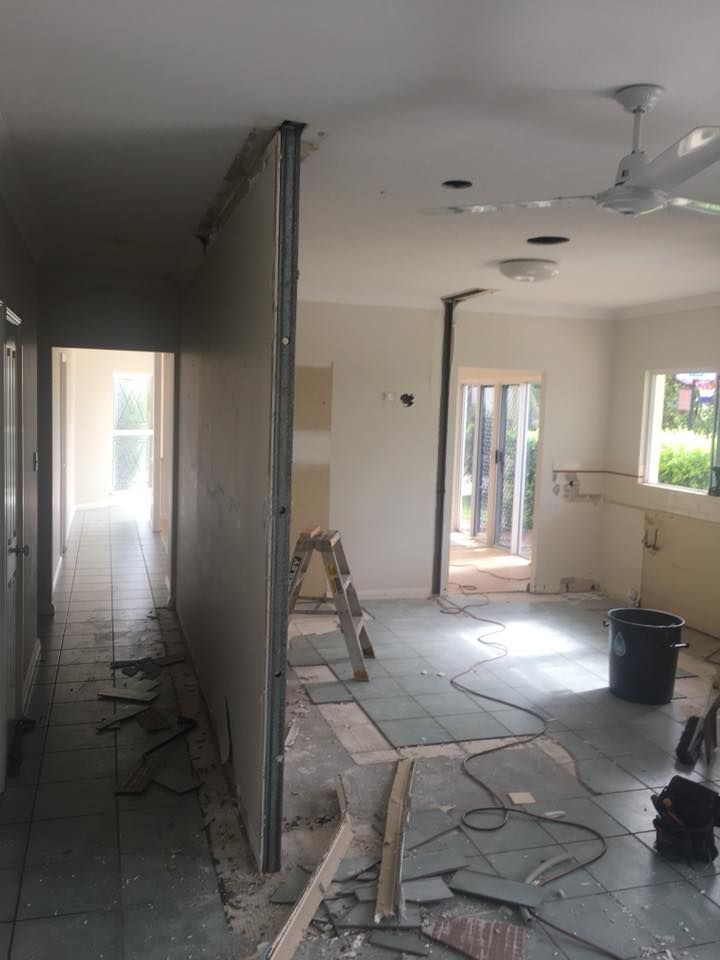 A Room With a Ceiling Fan and a Ladder in It is Being Remodelled — NGK Constructions In Freshwater, QLD