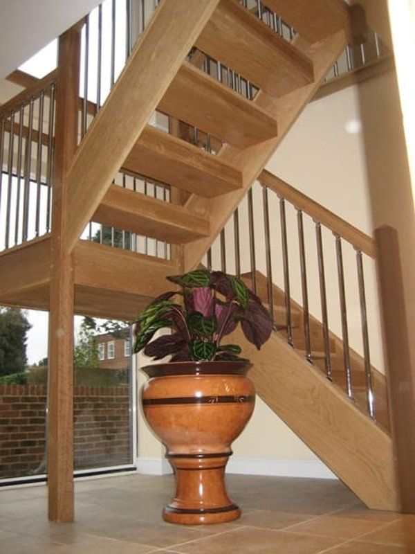 Wooden staircase with plant pot