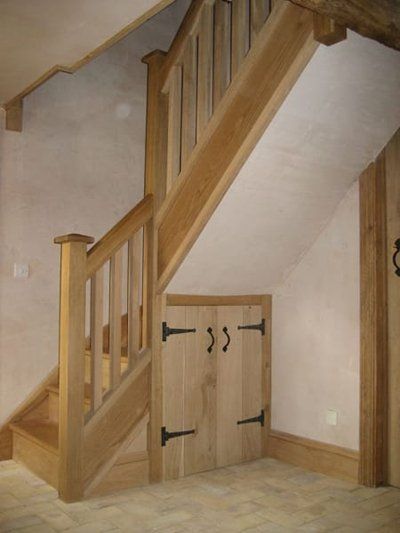 staircase with wooded door