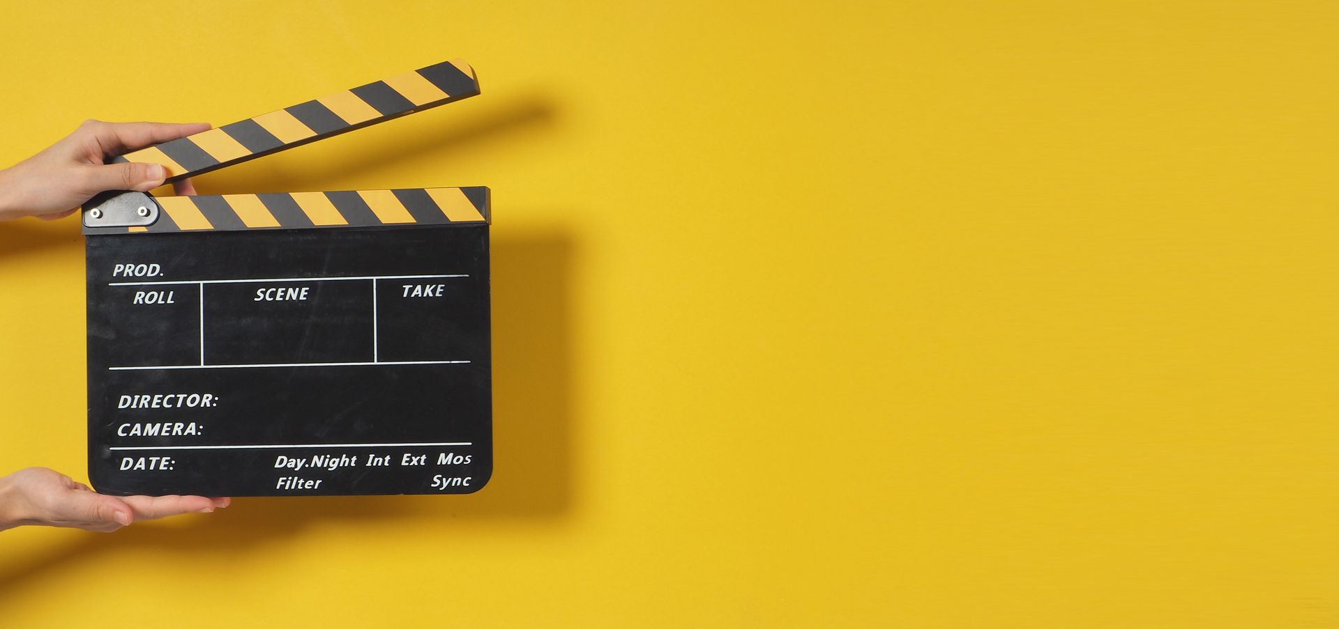 Movie board open on yellow background