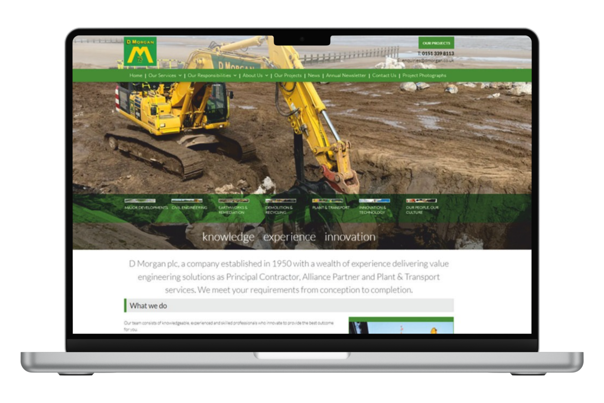 a laptop computer is displaying a website for a construction company .