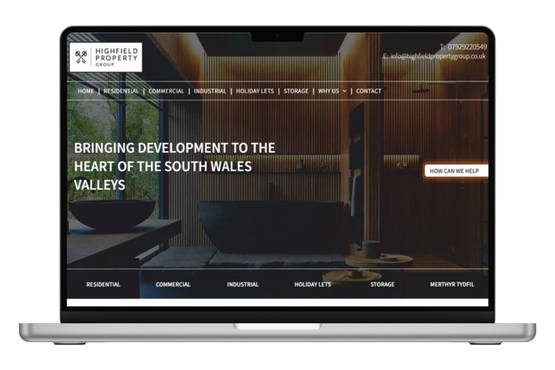 a laptop computer with a chemical plant on the screen .