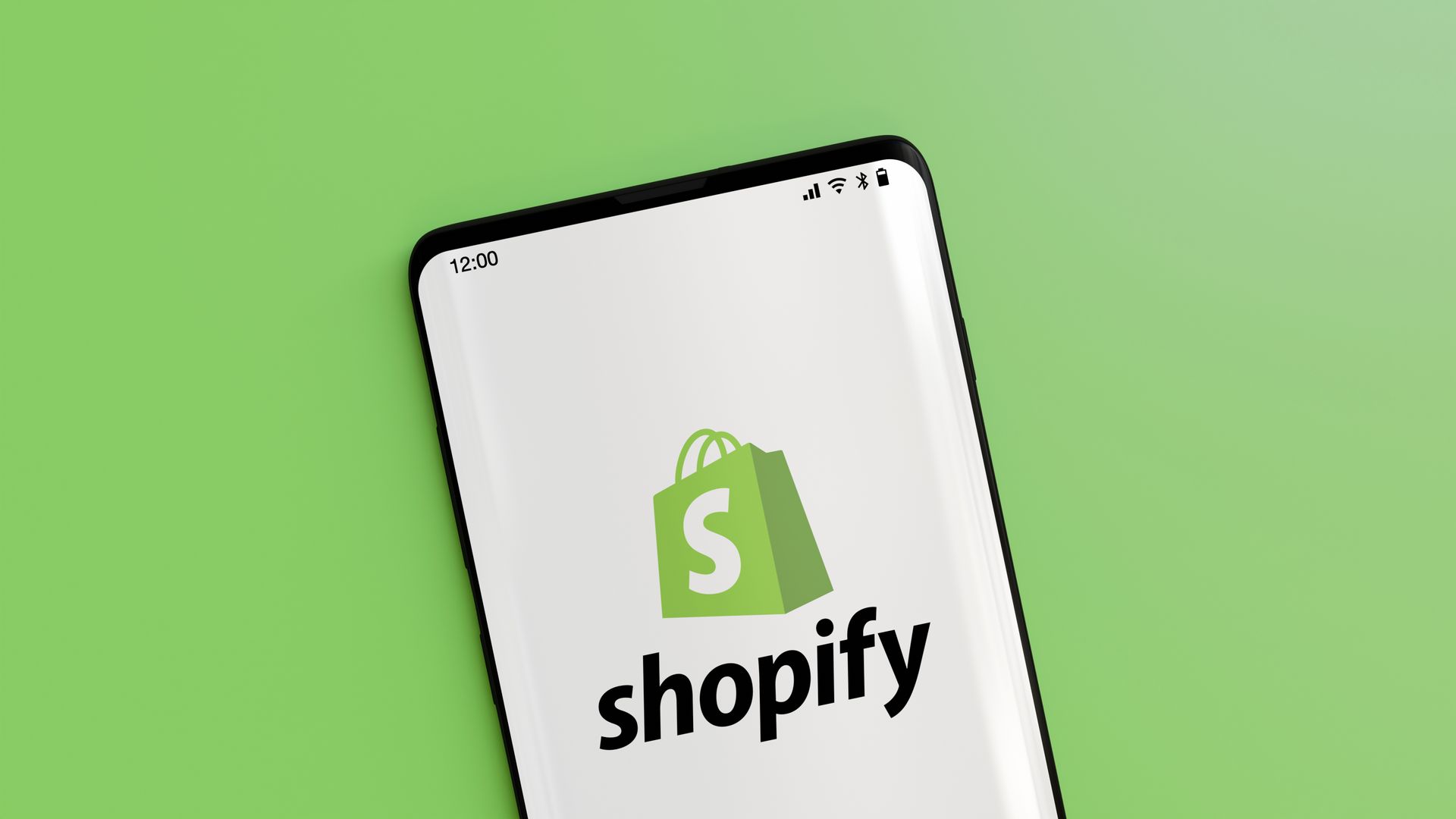 Shopify logo on a phone