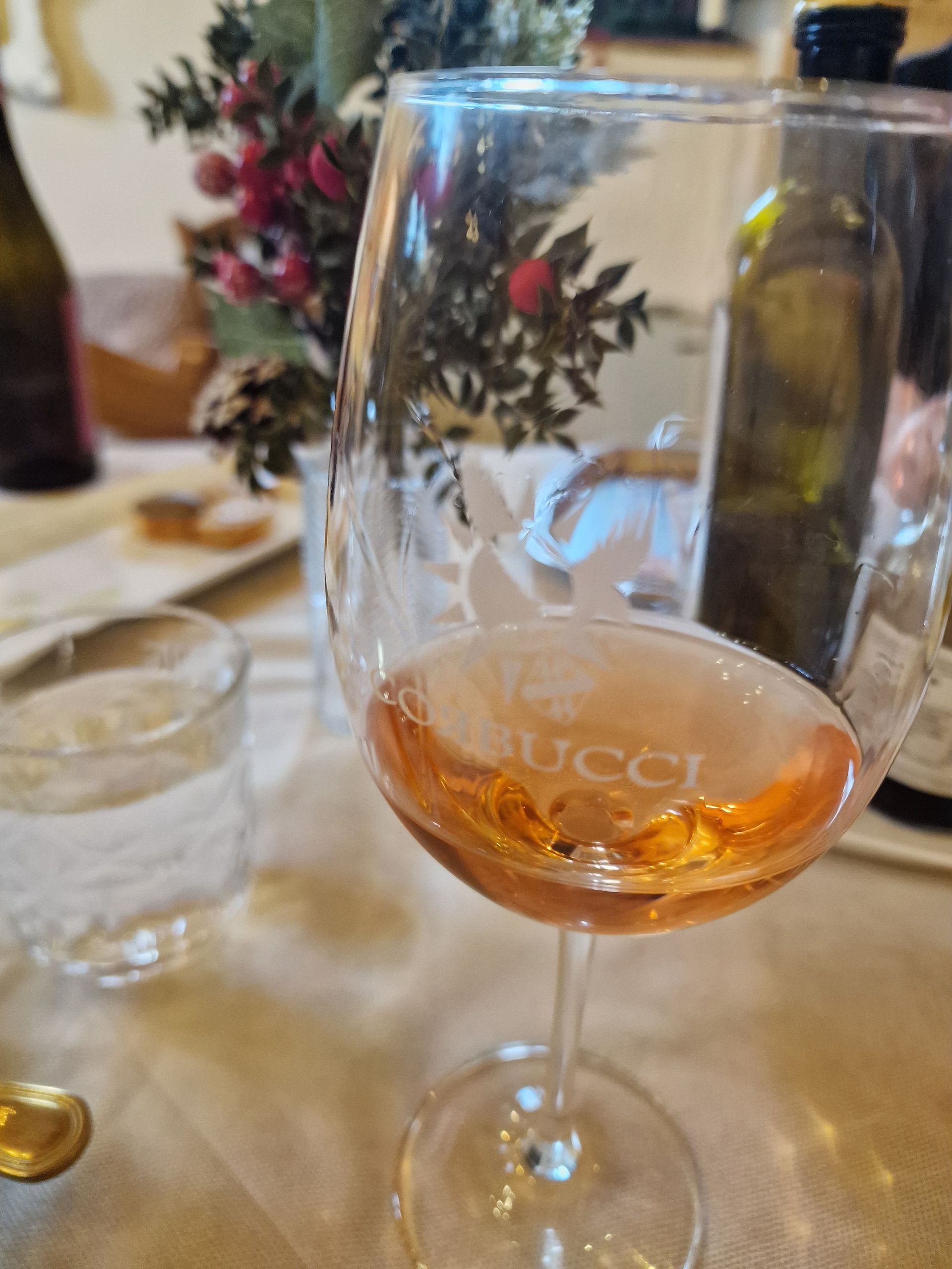 Glass of wine at a wine tasting in Tuscany.