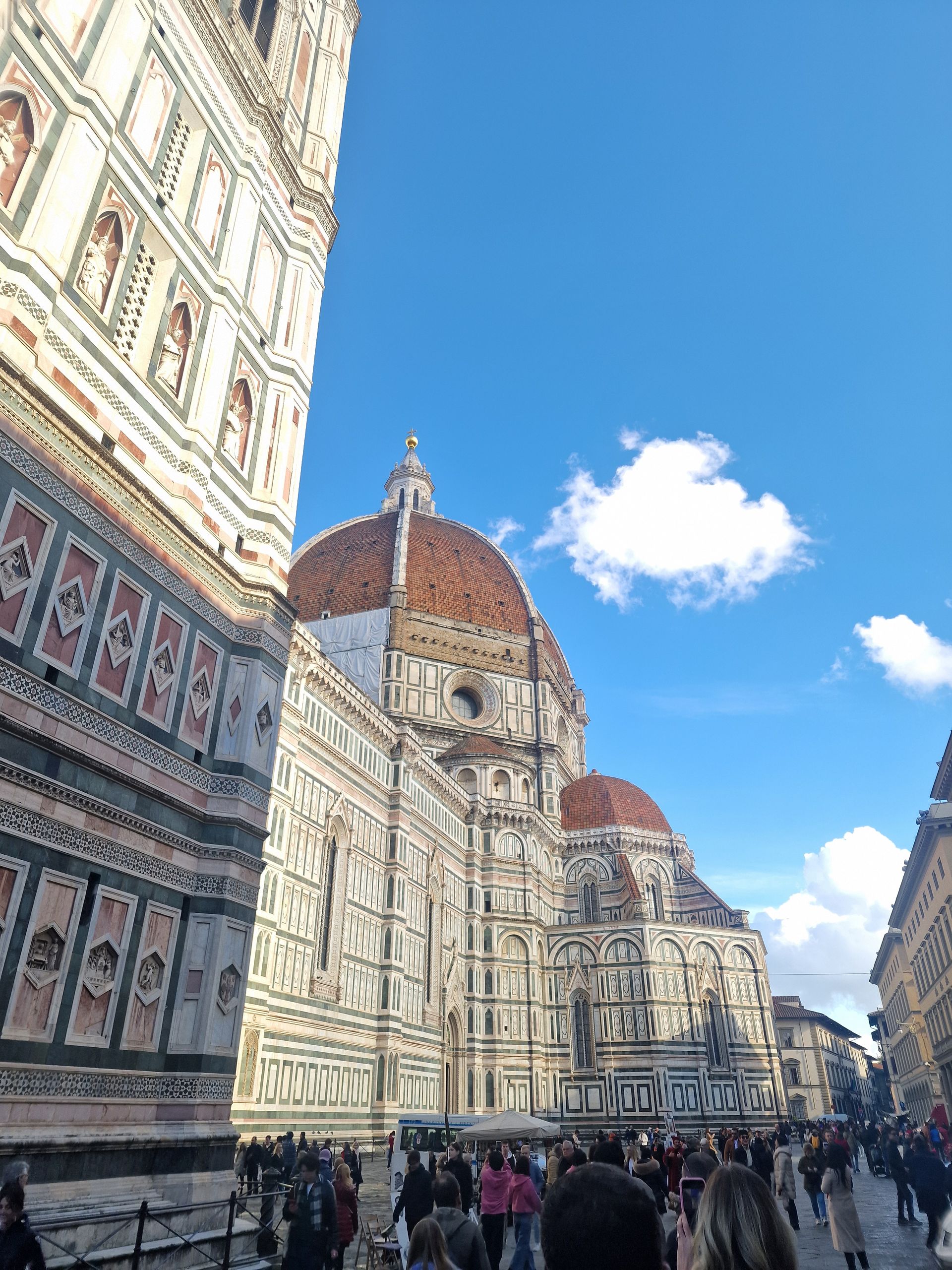 Side view of the Duomo in the streets of Florence.

