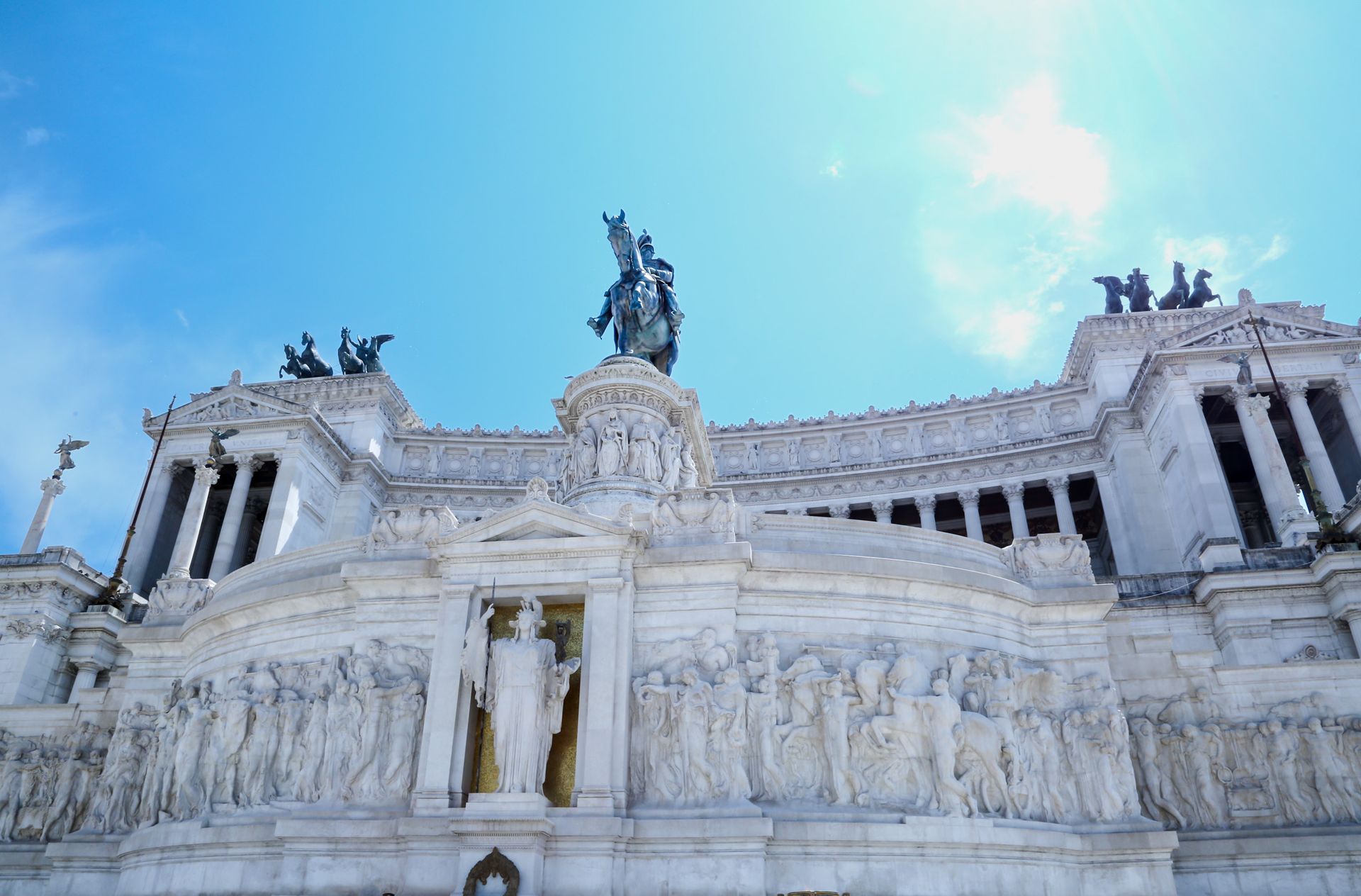 Interior of the Pantheon, Rome. Vast, domed ceiling with recessed panels, sunlight streams through the oculus.