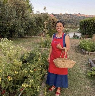 Chicca in her garden in Tuscany.
