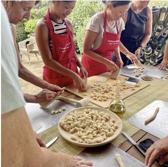 People making pasta in Tuscany