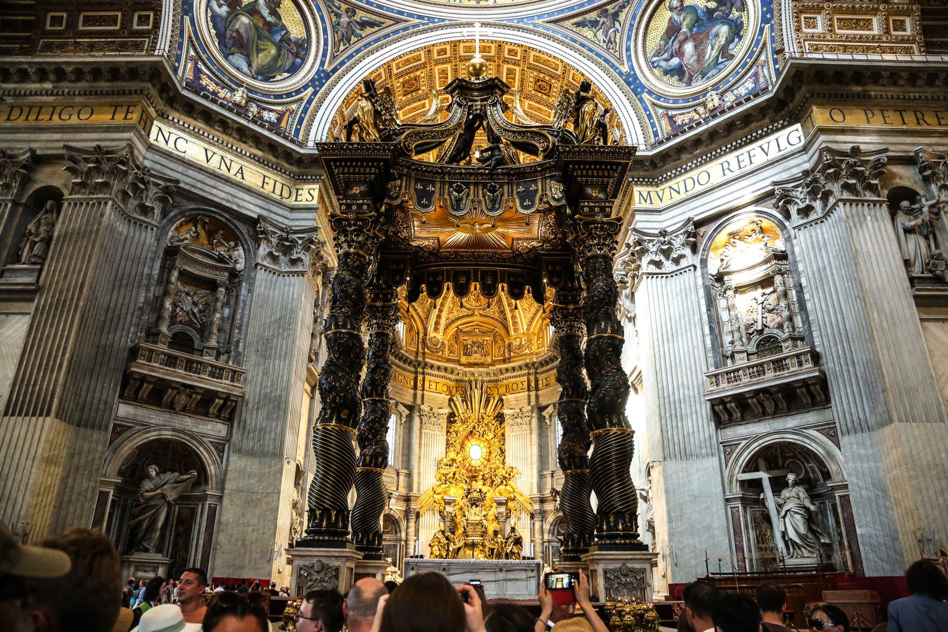 Arch of Constantine and Colosseum in Rome, Italy, at dusk.