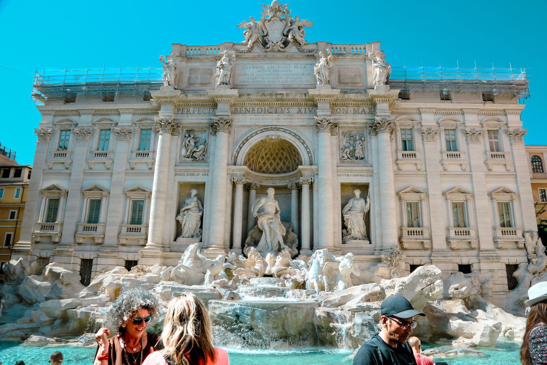 Spanish Steps in Rome, Italy, with a fountain in front, and buildings on either side.