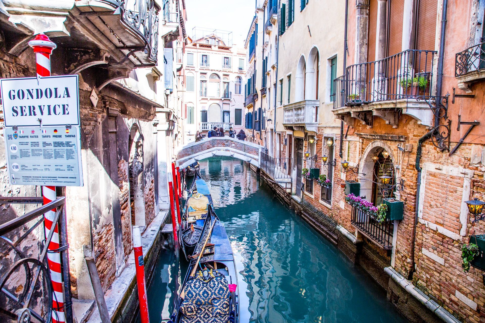 Gondola station on a canal in Venice.