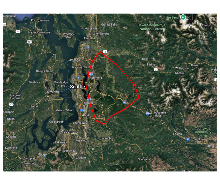 A map of seattle with a red circle around it