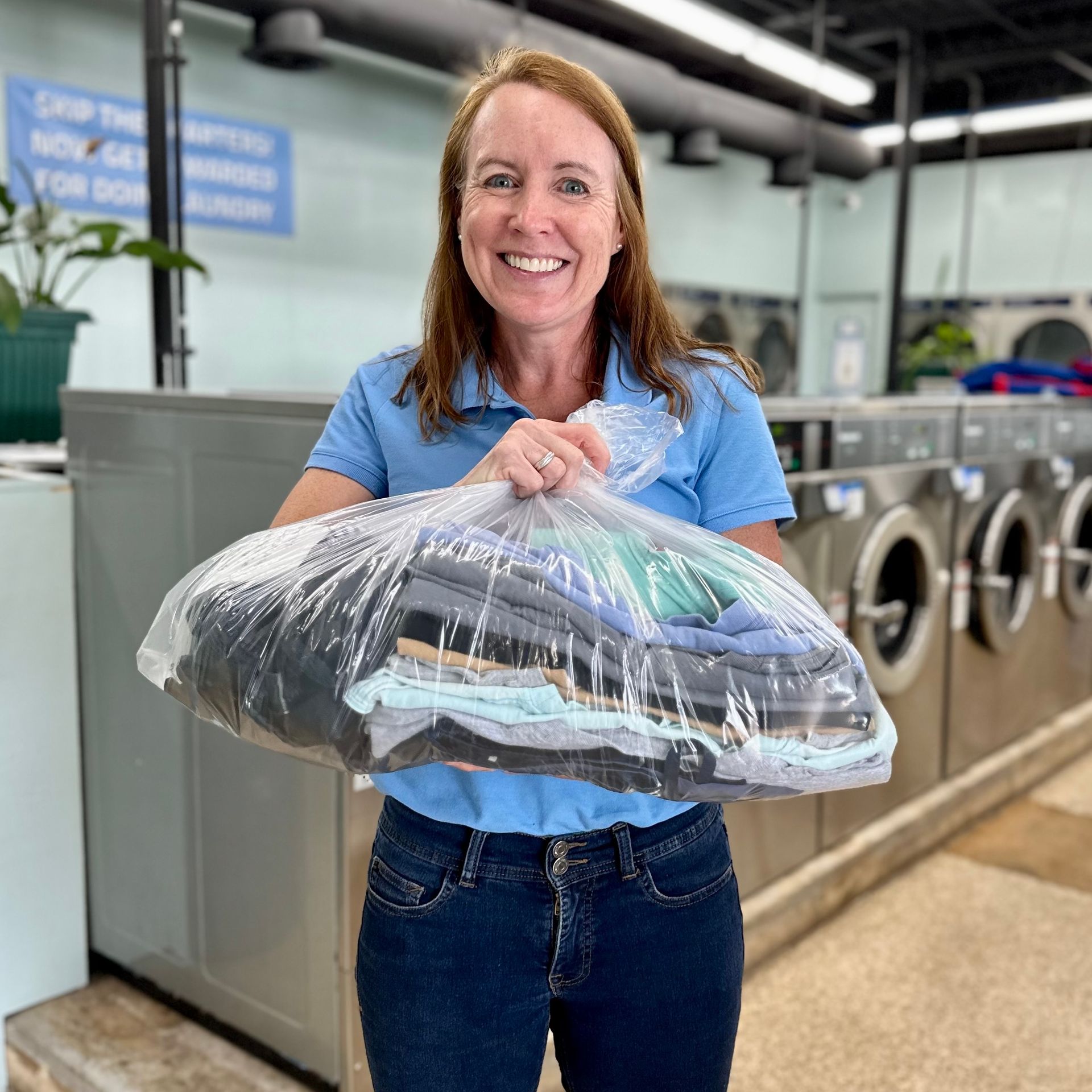 Wash & Fold Laundry held by owner Ellie