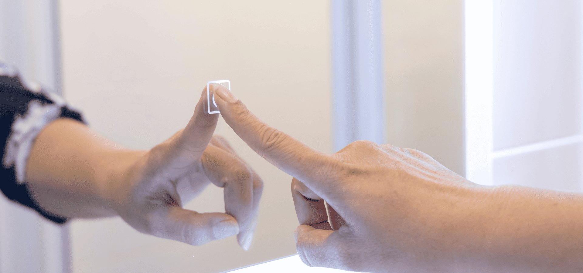 Homeowner interacting with a smart touch-supported mirror