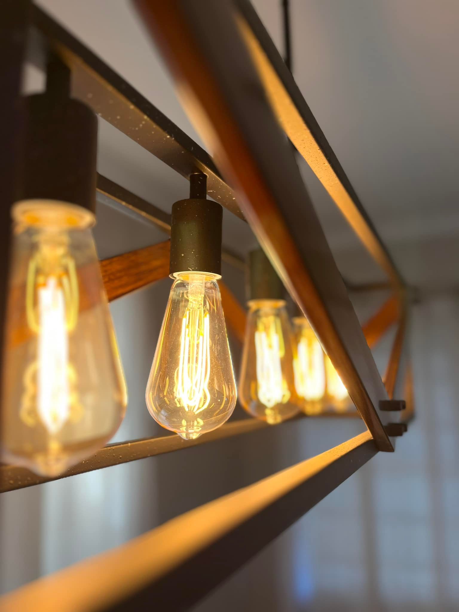A row of light bulbs hanging from a ceiling