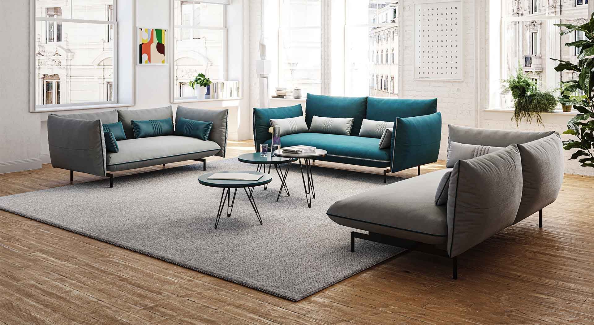 Un soggiorno pieno di mobili e un tappeto.