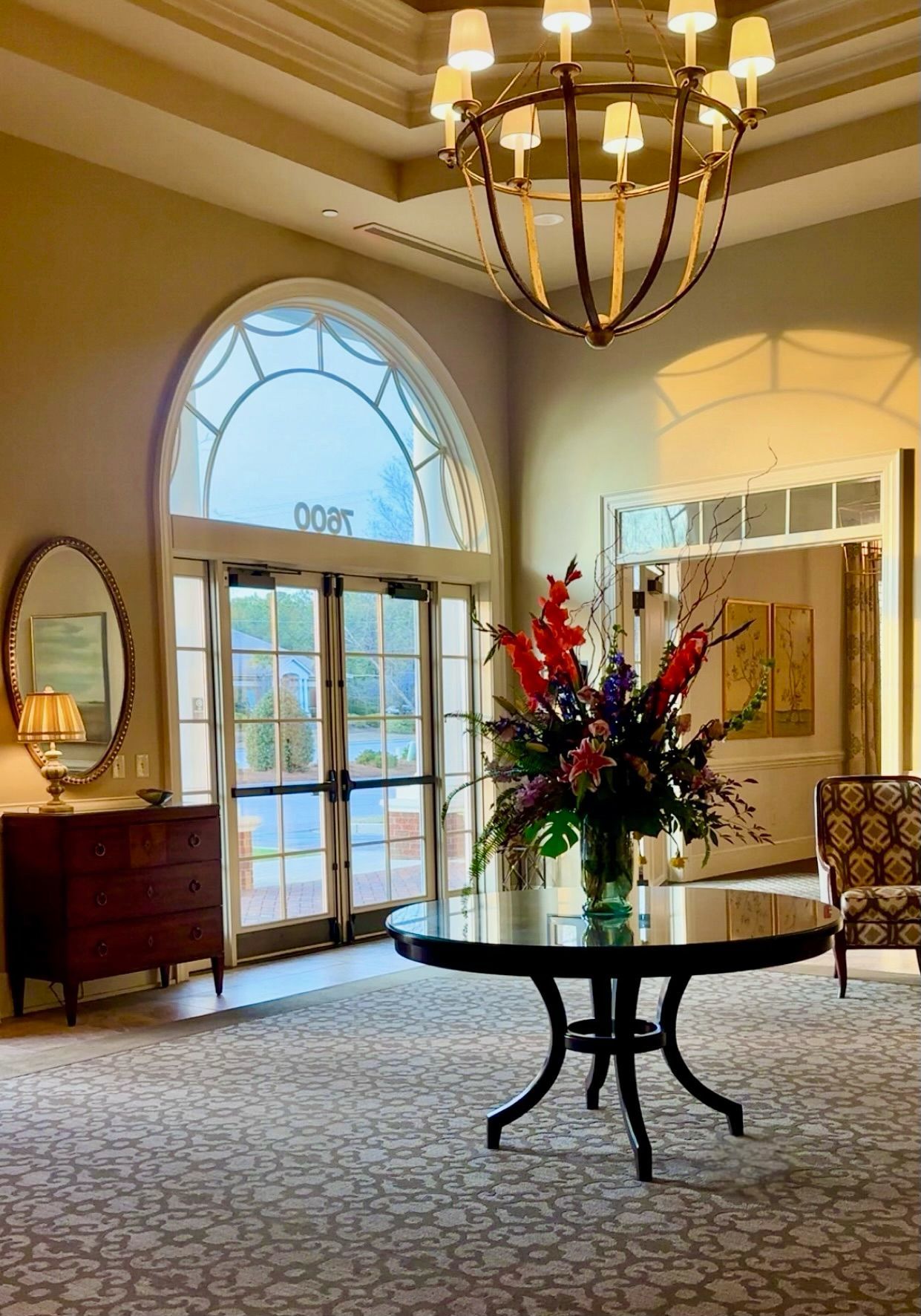 A man and a little girl are sitting on a couch.