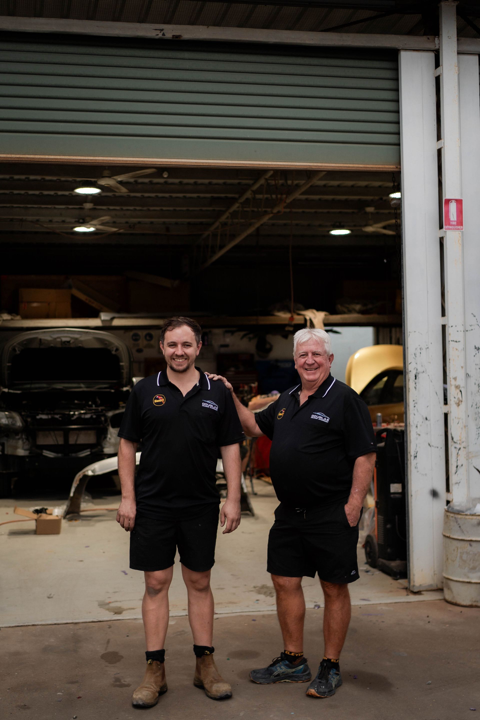 Owners Justin and David standing out front of the workshop— Douglas Collision Management In Currajong, QLD