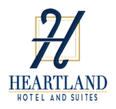 A logo for a hotel and suites called heartland hotel and suites.