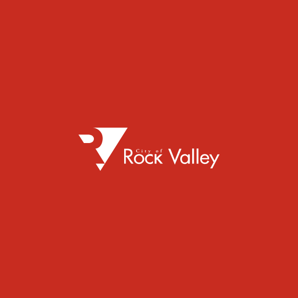 A logo for rock valley on a red background