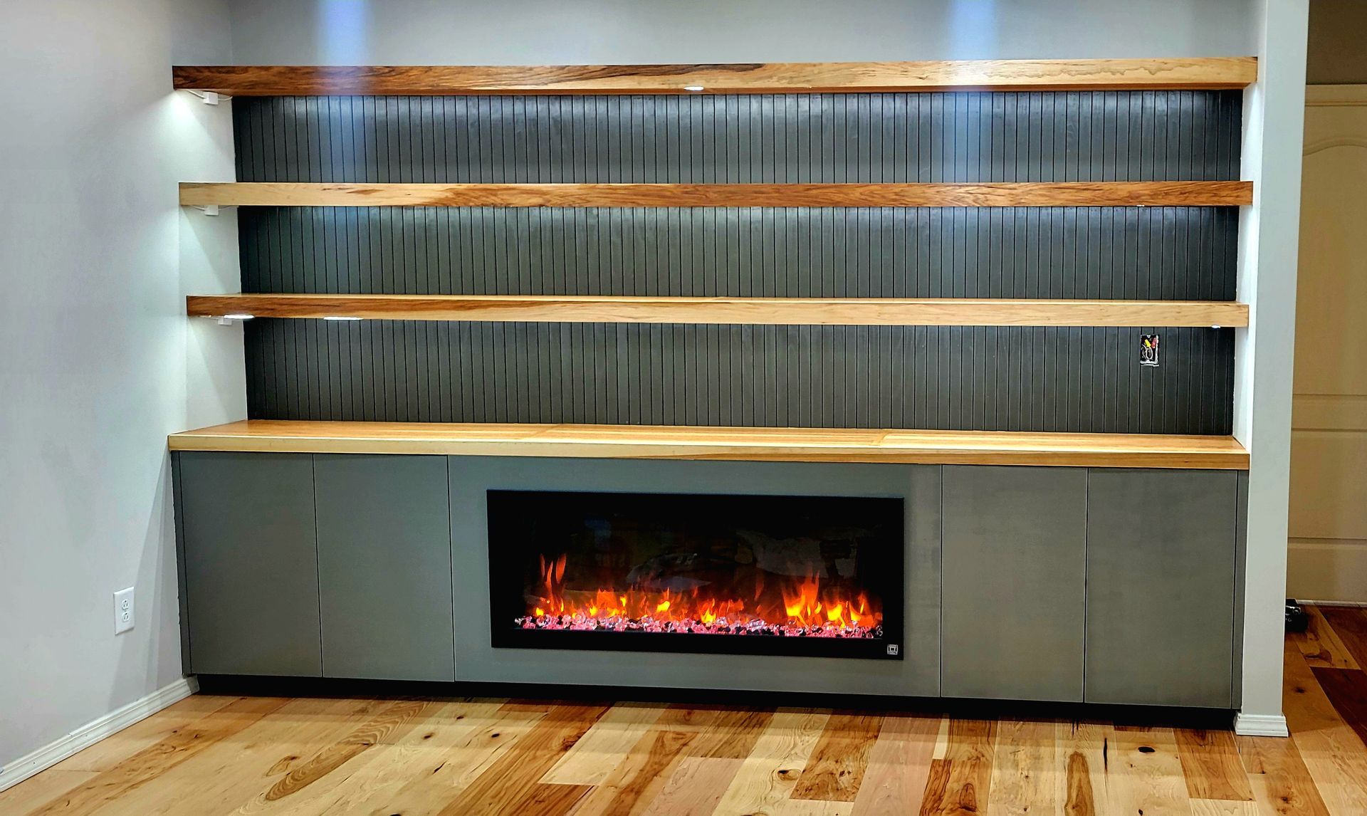 There is a fireplace in the middle of the room.