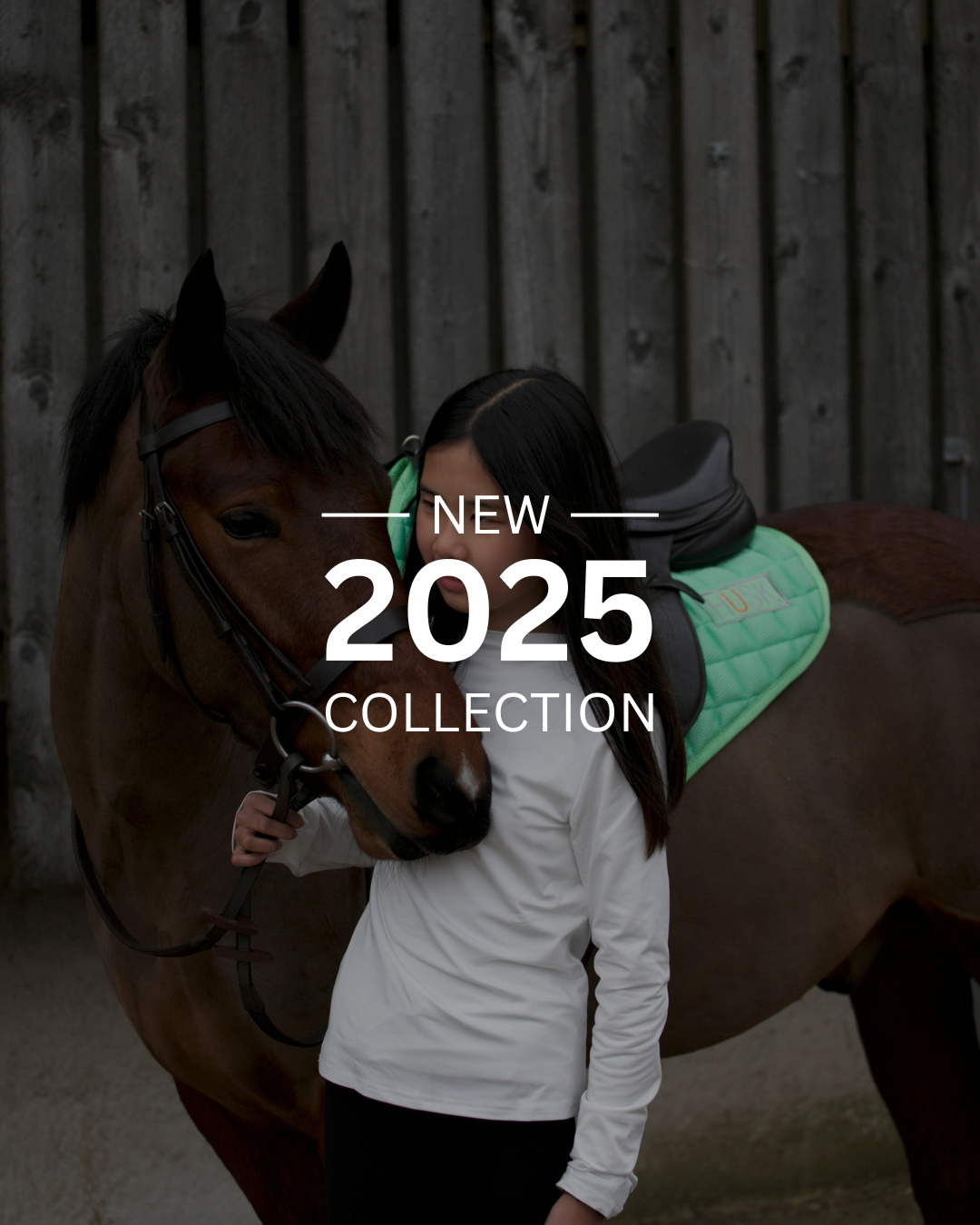 Girl with a horse, wearing a white shirt and black pants. The 2025 collection, new.