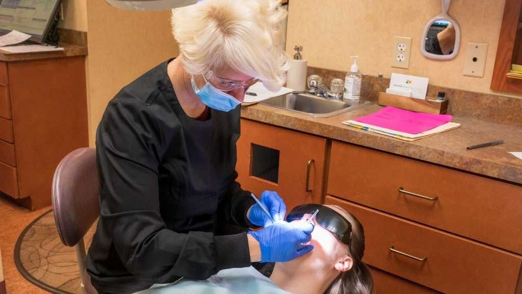 dental staff with patient | family dentist in Solon oh 44139