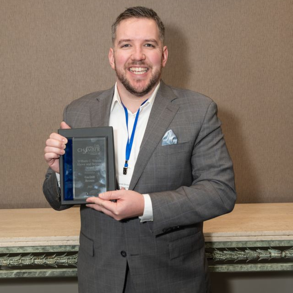 Dr. Ettore Palazzo presents Alicia Quaco with William C. Woods 'Above and Beyond' Award