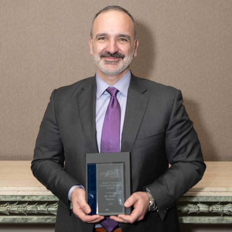 Dennis Newell presents Bonnie McLeod with the Anne J. Owen 'Community Service' Award