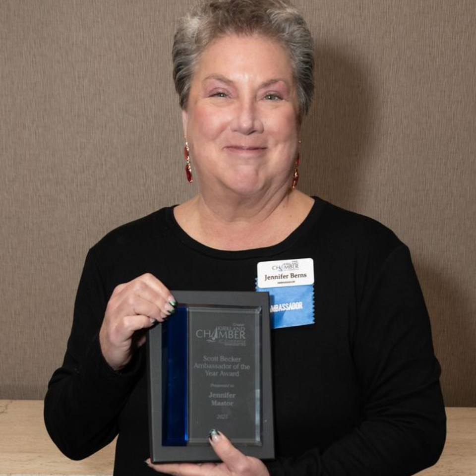 Christina Scheifer presents Mike Nakamura with the Scott Becker 'Ambassador of the Year' award