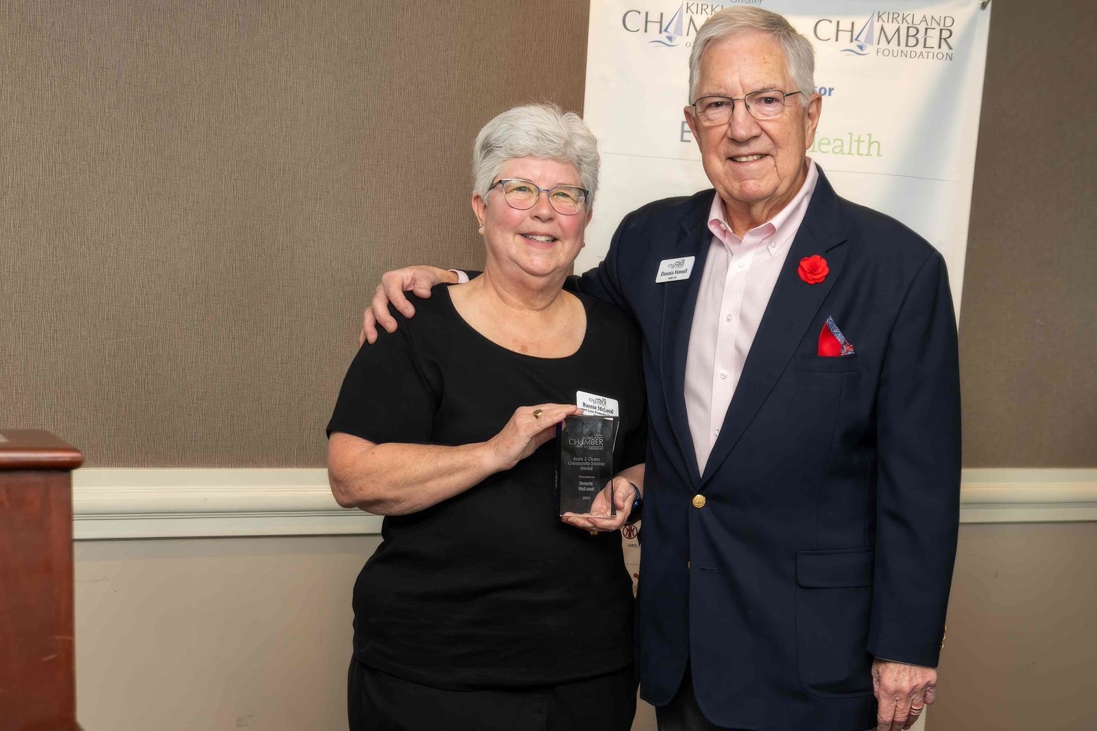 Dennis Newell presents Bonnie McLeod with the Anne J. Owen 'Community Service' Award