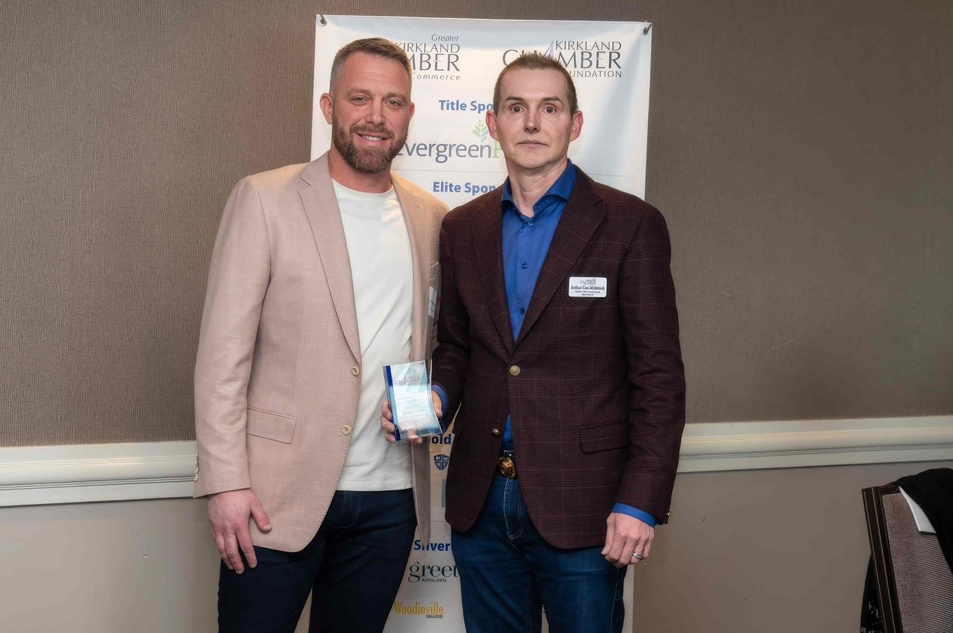 Stacy Eakman presents Art Gee-McIntosh the Charles O. Morgan 'Business Excellence' Award