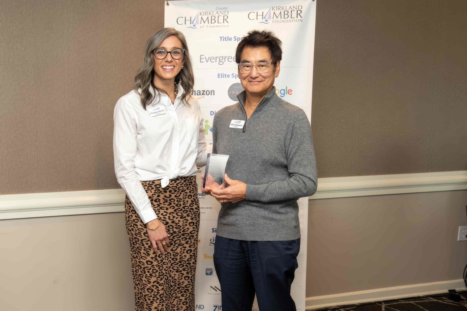 Christina Scheifer presents Mike Nakamura with the Scott Becker 'Ambassador of the Year' award