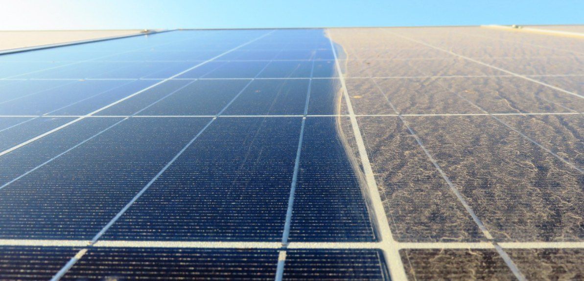 A Close Up of a Solar Panel With a Blue Sky — EDU-BABA Pressure Cleaning in Belconnen, ACT