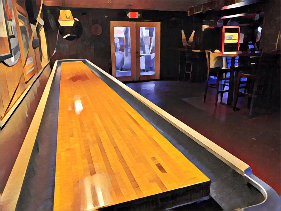 A painting of a bowling alley in a bar
