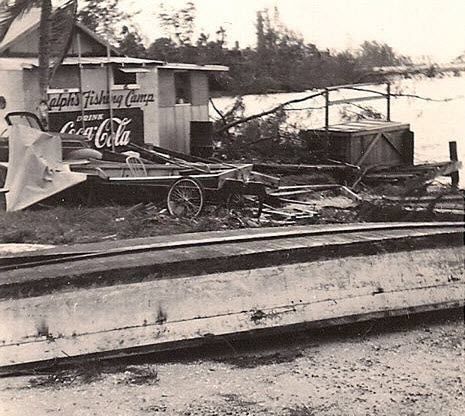A black and white photo of a coca cola sign